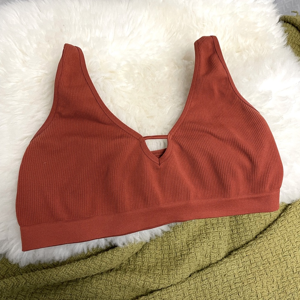 Lively Burnt orange keyhole yoga sports bra large